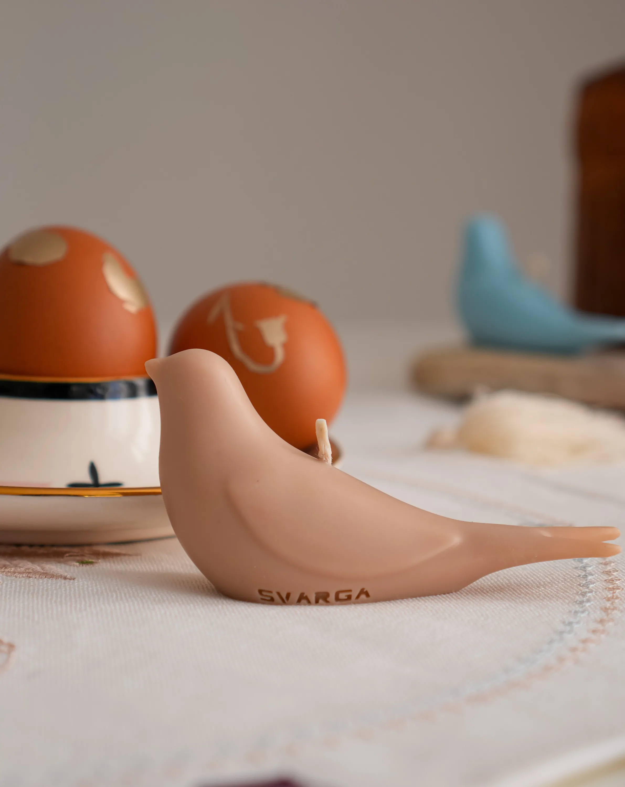 Свічка ластівка бежева